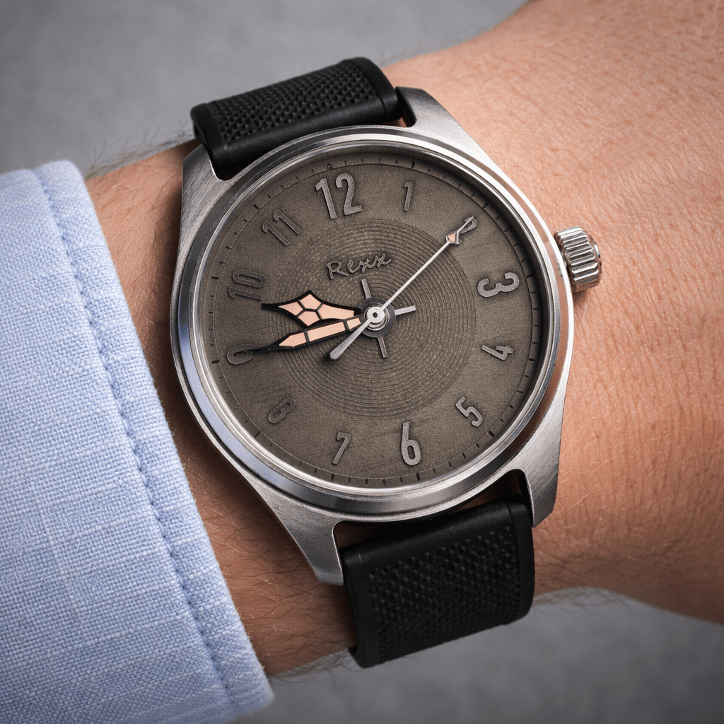 custom Iron Cockpit watch on the wrist showing engraved dial design