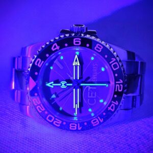 Custom submariner style watch with handmade cardboard dial glowing in the dark