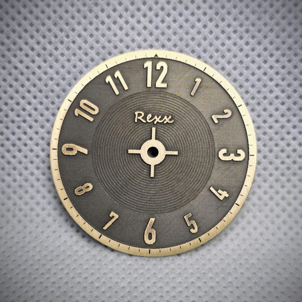 Rexx-iron-cockpit-twotone-watch-dial-front laser engraved brass watch dial with raised numerals created using reverse etching