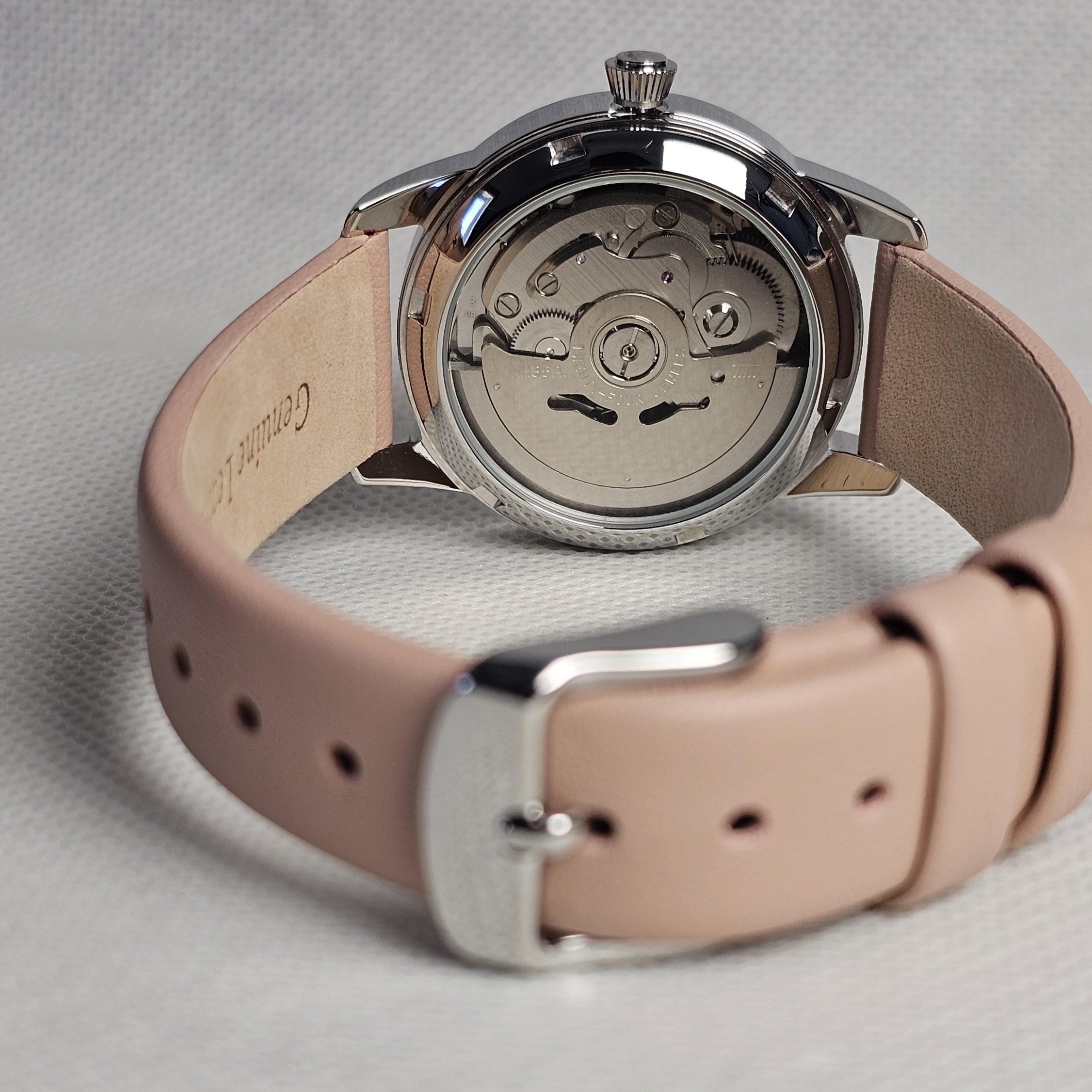 Seiko Cocktail mod caseback view automatic movement