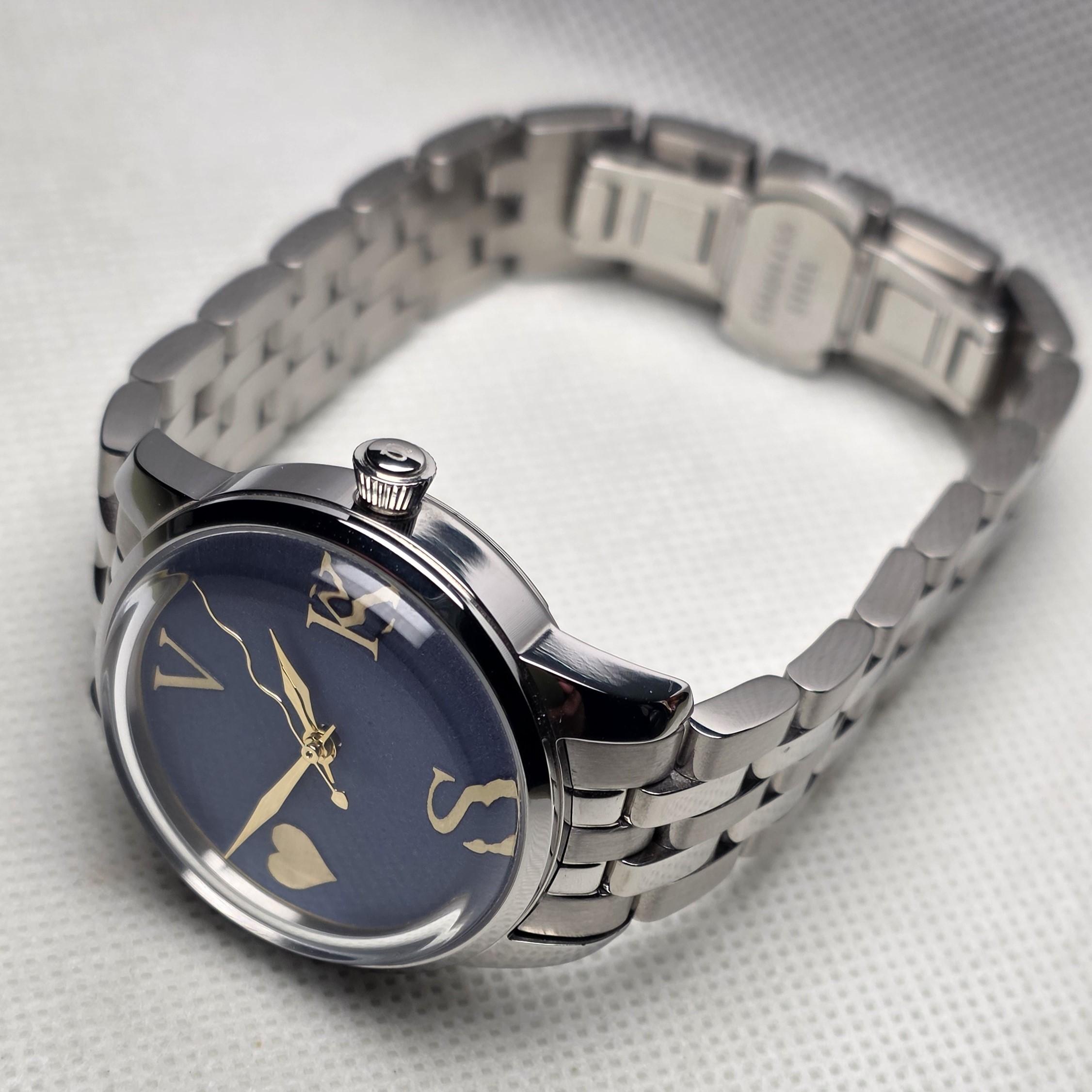 Side view of custom Seiko Cocktail 33mm blue watch