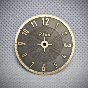 Square featured image of a custom engraved brass watch dial with two-tone finishing