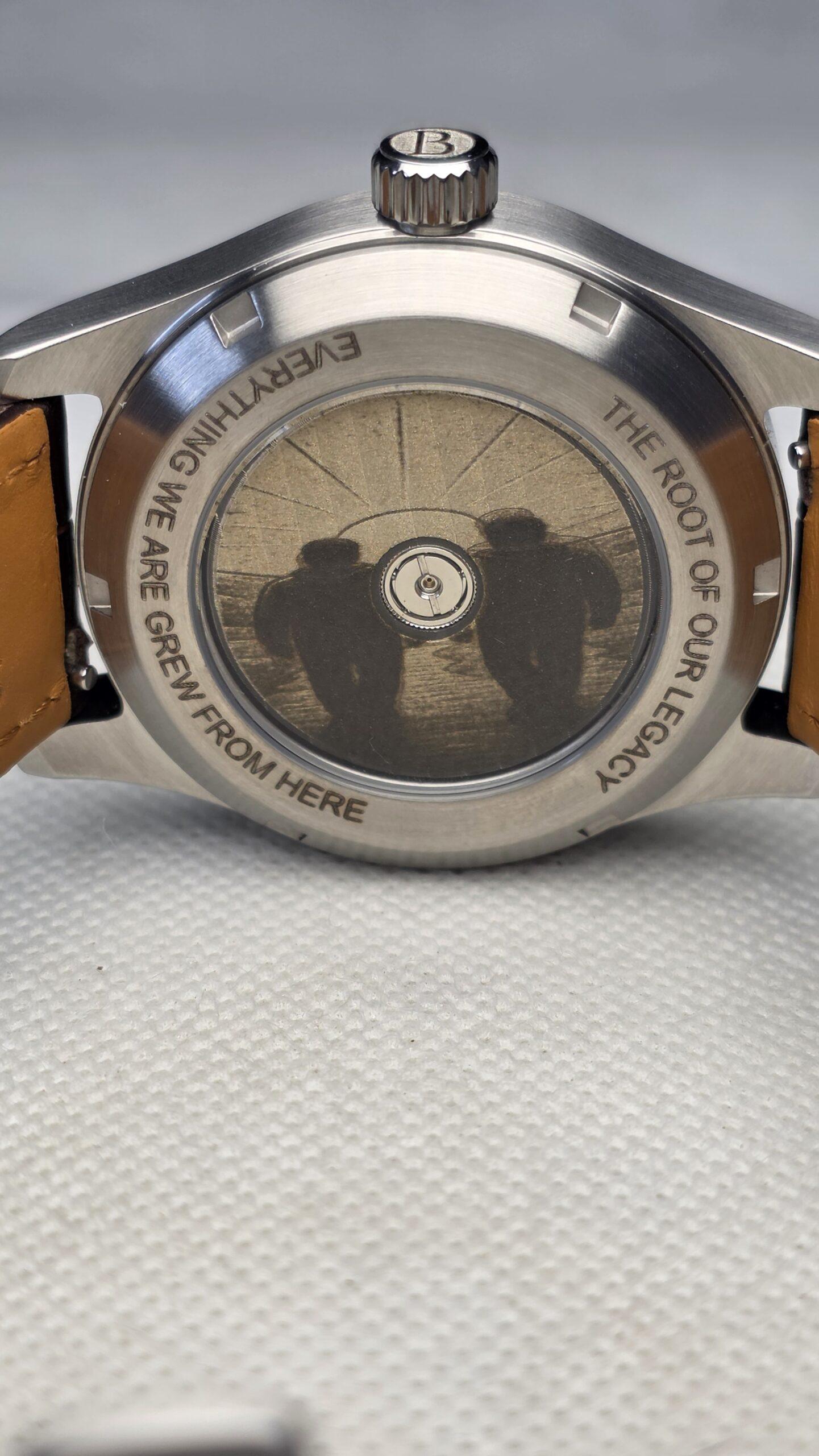 Watch case materials shown through polished and brushed steel-tone finishing on a custom watch case