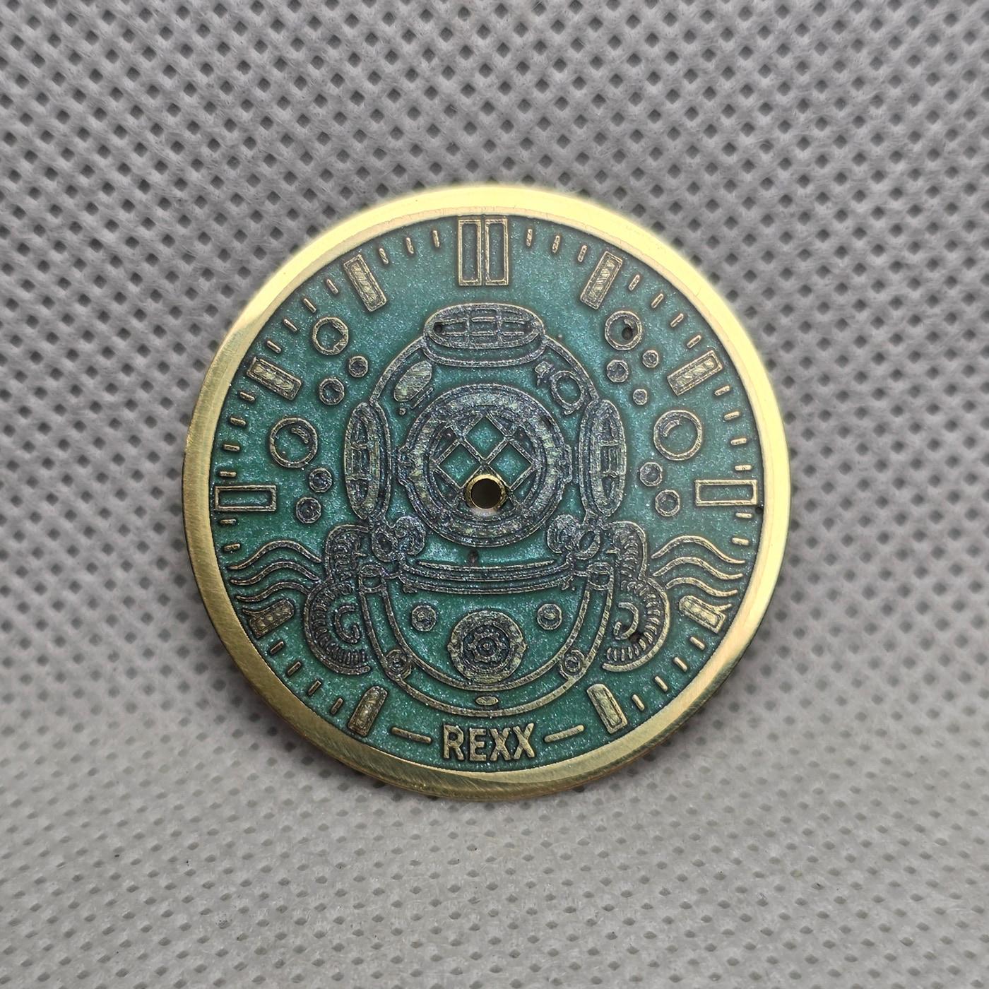 Deep Heritage engraved brass watch dial with darkened surface and turquoise resin fill